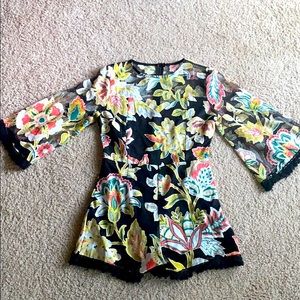 A black formal lace romper